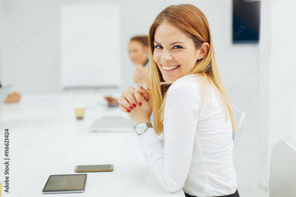 Business woman posing at the meeting Business woman posing at the meeting