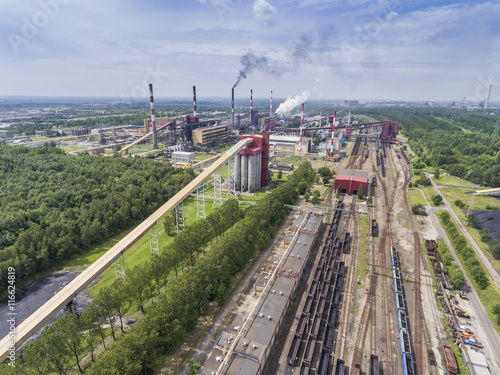 Steel factory with smokestacks at suny day.Metallurgical plant.