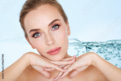 Canvas Print beautiful young woman face and hands
