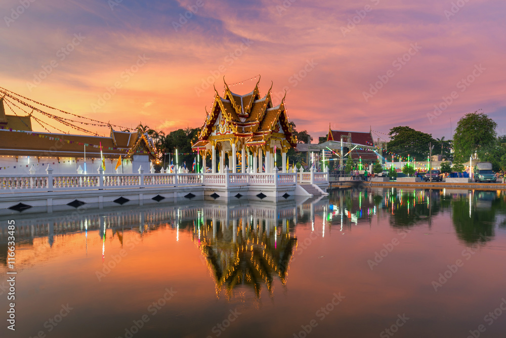 Beautiful Thailand temple in water reflection during sunset