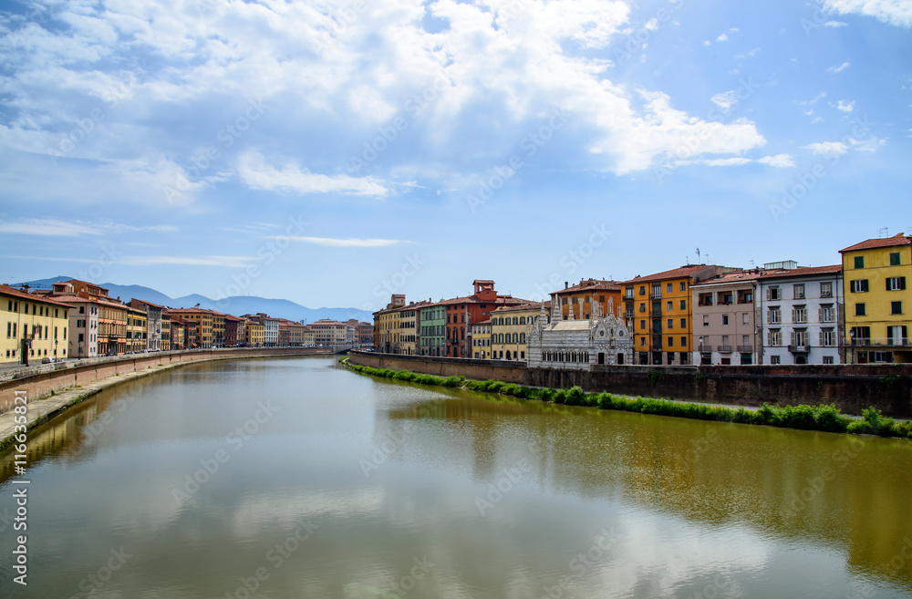 old architecture and river Arno, Pisa, italy
