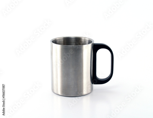 close up aluminum cup with dark blue plastic handle isolated on white background, chromed mug for hot drinks on camping trips