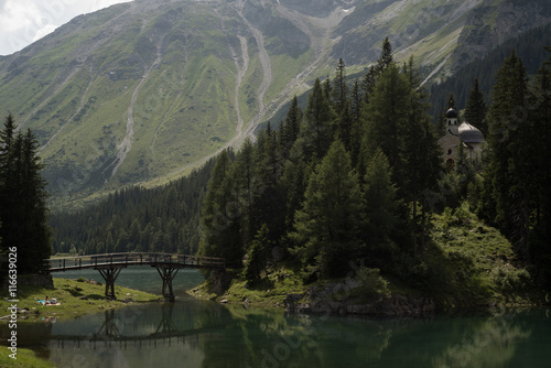 Idyllic chapel of Obernberger See in Tyrol Austria photo