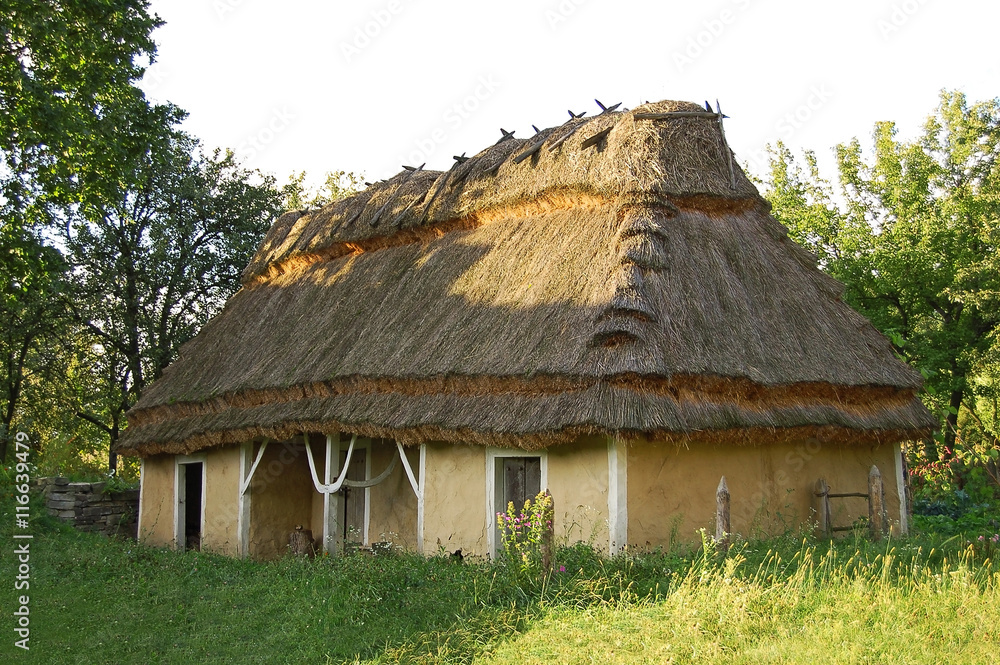 Ancient hut with a straw roof