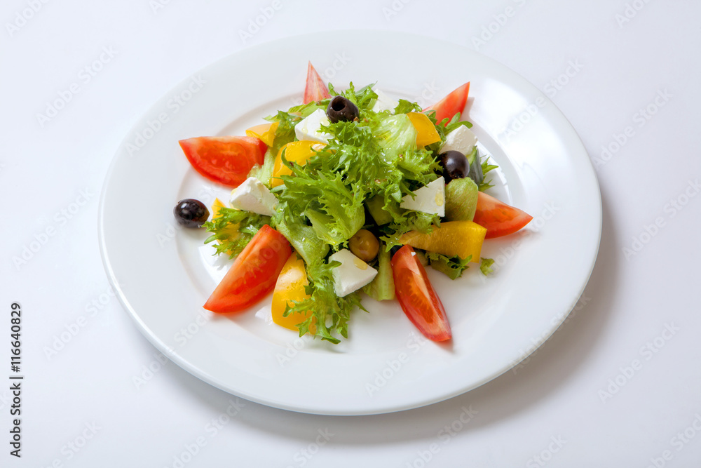 Salad of fresh vegetables with feta cheese.