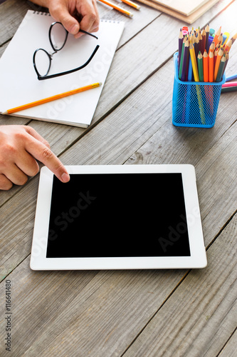 Man Clicks On The Tablet Screen