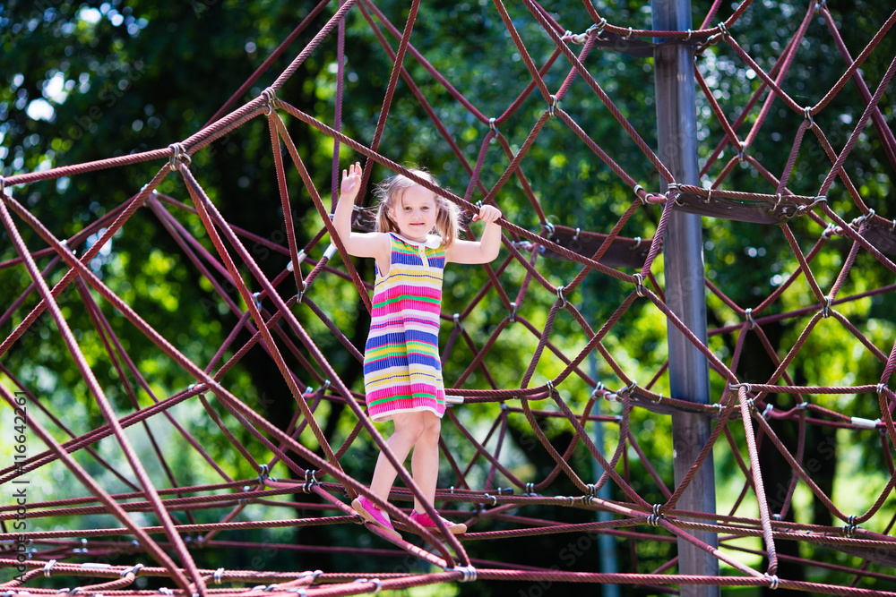 Child having fun on school yard playground