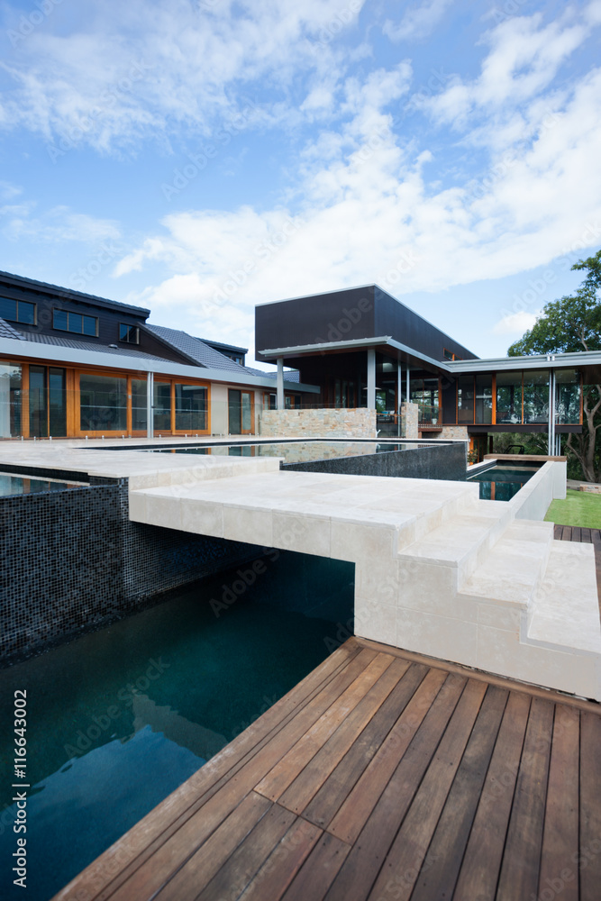 Fototapeta premium Tiled stairs on the wooden floor with a bridge