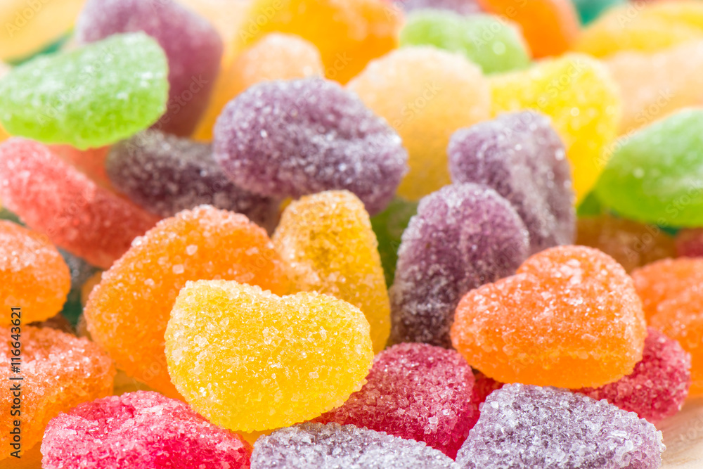 Colorful sugary candy heart shape background Colorful sugary candy heart shape background