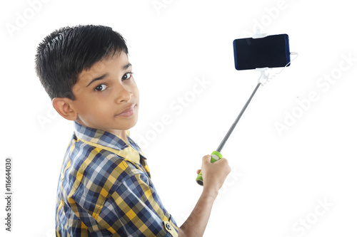 Boy with the selfie stick photo