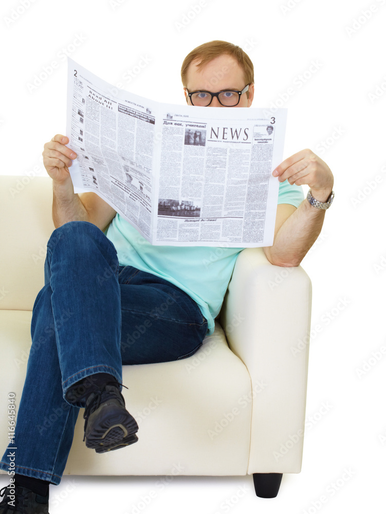 Naklejka premium man reads the news in the newspaper