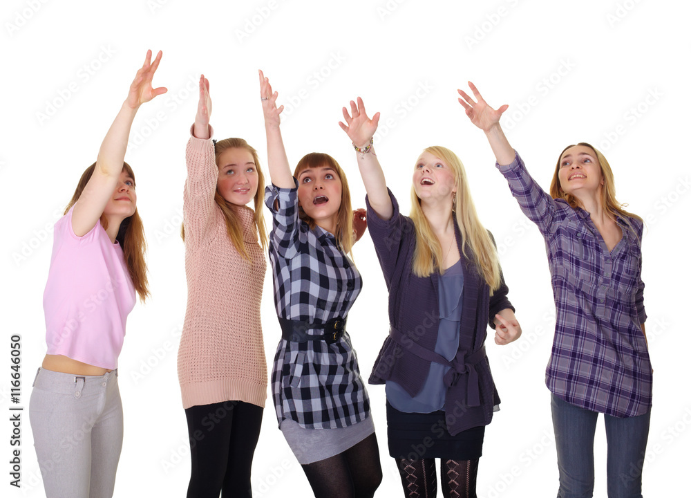 Fototapeta premium Girls pulling together hands up isolated on white background