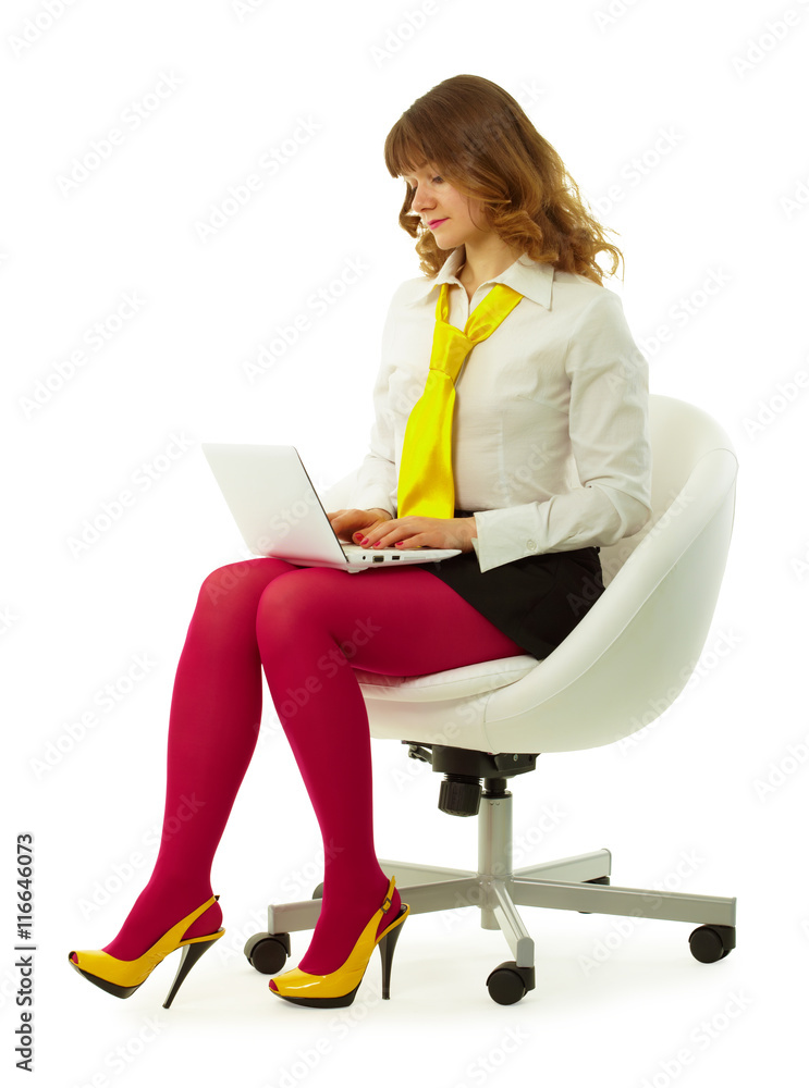 Girl in a bright dress with a laptop Girl in a bright dress with a laptop
