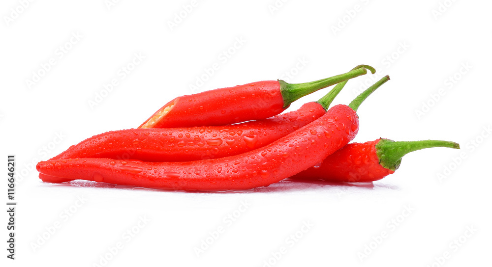 Red chili pepper with water drops on white background.