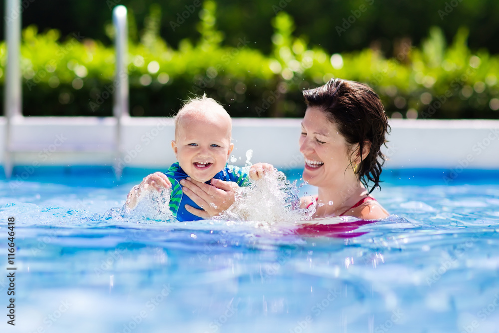 Mother and baby in swimming pool Mother and baby in swimming pool