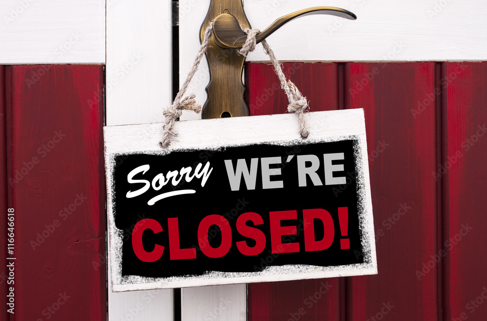 Holzschild mit Sorry we´re closed, wir haben geschlossen StockFoto Adobe Stock