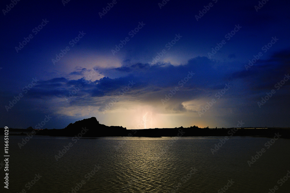 Lightning at night over the lake Lightning at night over the lake
