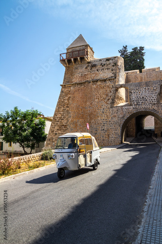 Italian symbolic car in street of Italy, three wheels Apecar