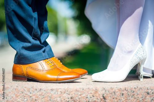Bride and groom legs.