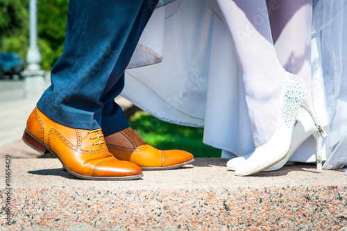 Bride and groom legs.