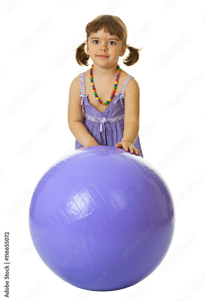 Little girl with a large rubber ball on white Little girl with a large rubber ball on white