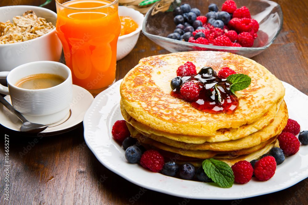 Pancakes with berries and maple syrup Pancakes with berries and maple syrup