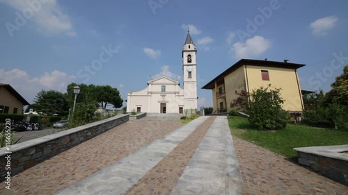 in italy cadrezzate  ancient   religion  building    for catholic and clock tower. photo