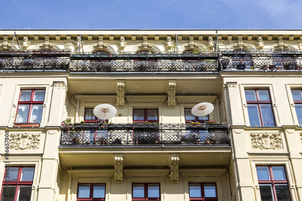 balcony of an old house with stucco in Berlin, Kreuzberg