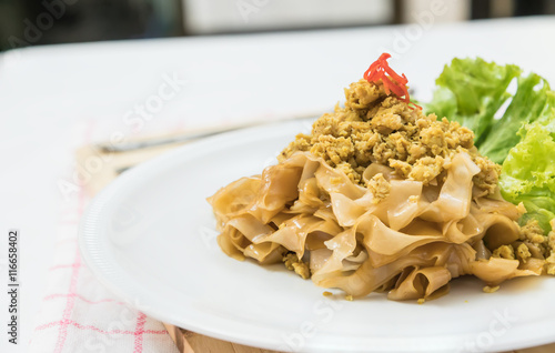 Stir fried rice noodle with pork (Pad See Eiw) photo