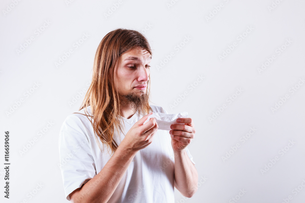 Man with hygienic tissue Man with hygienic tissue
