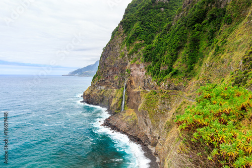 North atlantic coast, Island Madeira coastline, impressiv mountain with waterfall from Veu da Noiva Viewpoint, Ponta do Poiso