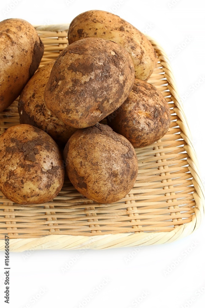 Freshly Harvested Potatoes on White Background Freshly Harvested Potatoes on White Background