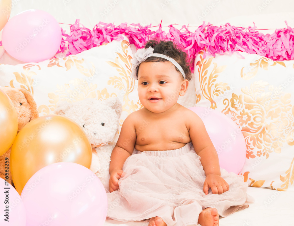 Baby Girl Sitting With Pillows and Balloons Baby Girl Sitting With Pillows and Balloons
