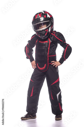 Race car or bike driver. The boy in the costume of the racer isolated on white background © sheikoevgeniya