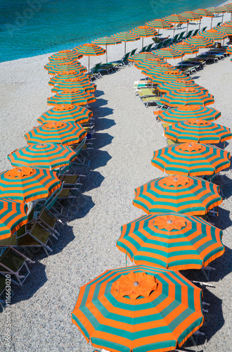 Fototapeta Naklejka Na Ścianę i Meble -  Rows of umbrellas on the beach