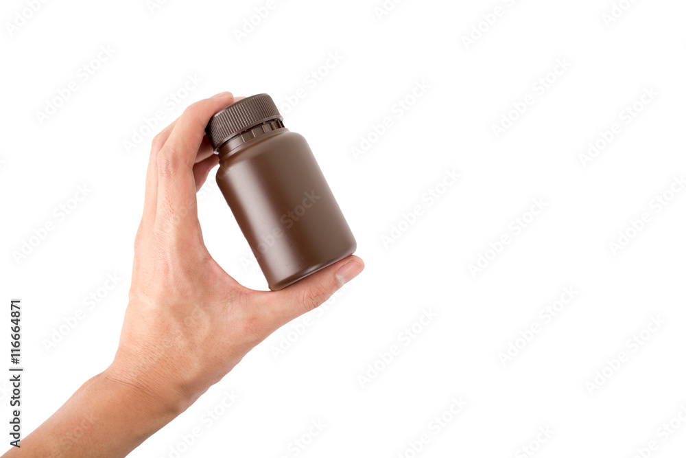 Isolated of hand holding medicine bottle on white background Isolated of hand holding medicine bottle on white background