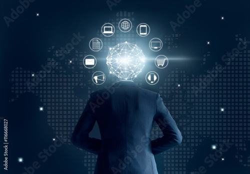 Businessman with global network connection head, on dark background photo