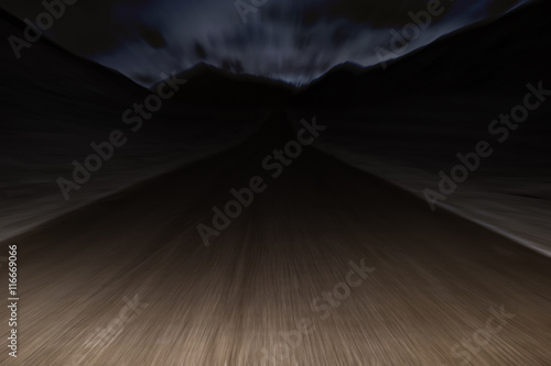 motion speed of old rusty car driving along the road at night