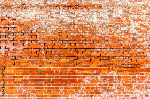 The grungy brick wall pattern of exterior building.