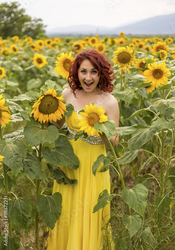 Woman in a sunflower field #116672231