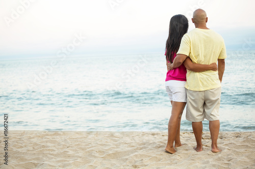 Asian couple at the beach.