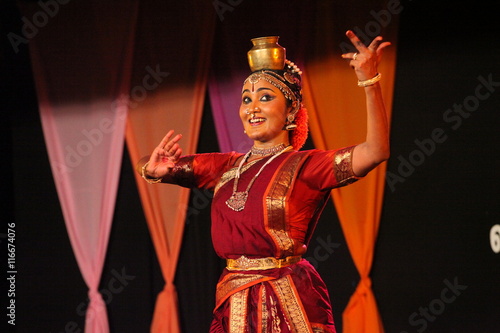 pot and plate dance or tarangam is an integral part of kuchipudi dance,making it different form other dance forms photo