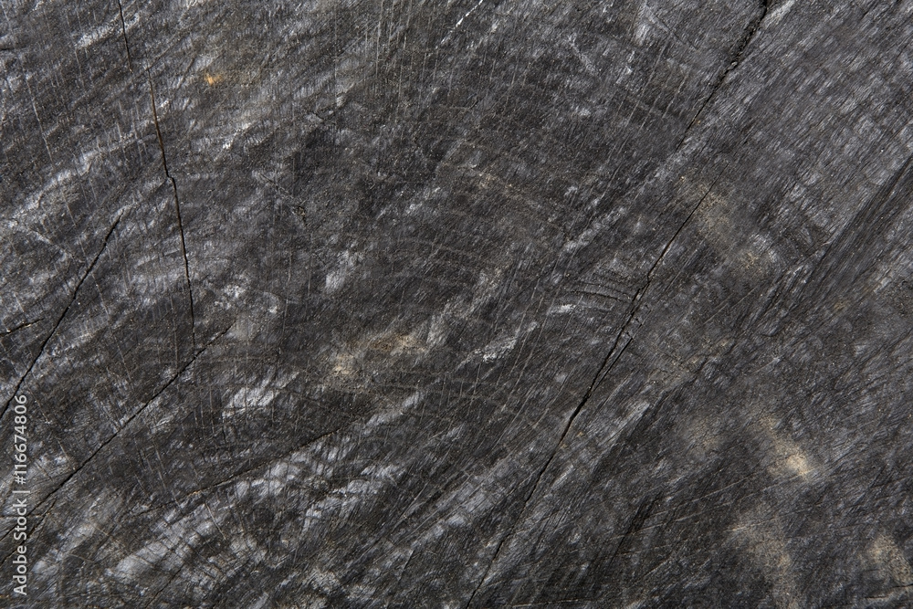 Dark gray or black wood texture closeup background Dark gray or black wood texture closeup background