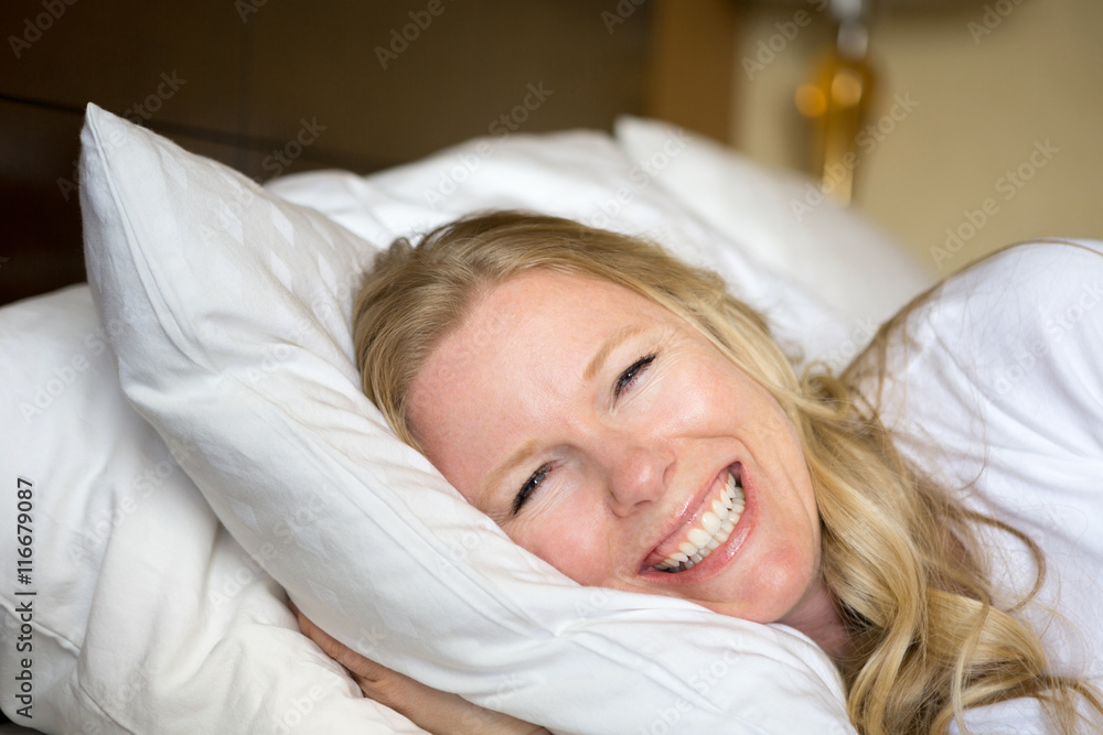 Fototapeta premium woman sleeping in bed.
