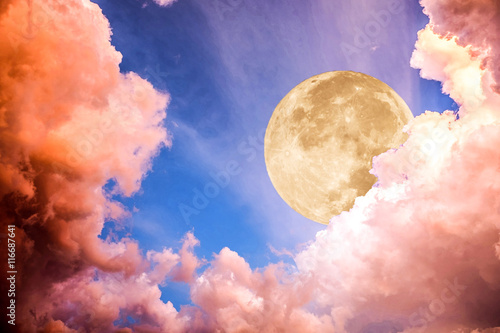 Dramatic cloud with moon light on blue sky