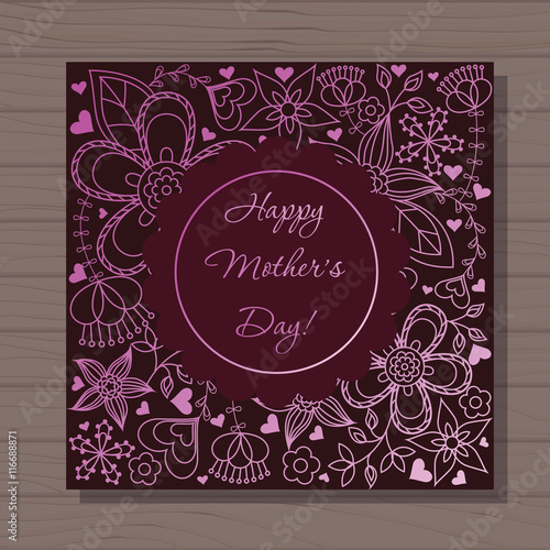 Happy mothers dat card on wooden background