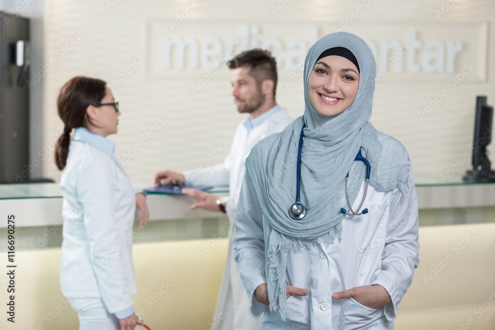 Fototapeta premium Medical team in different races standing indoor