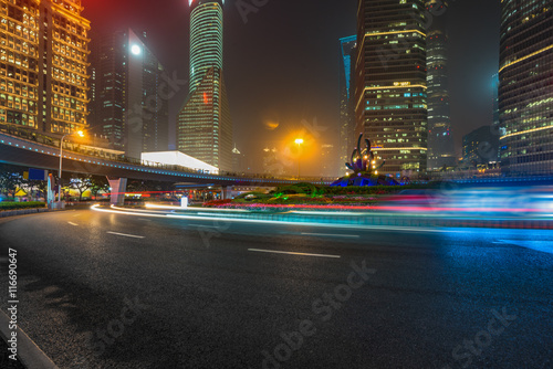 light trails at downtown district shanghai china.