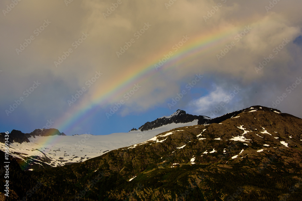 Rainbow over mountains in the inside passage