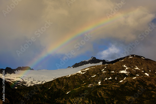 Rainbow over mountains in the inside passage